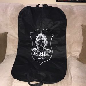 Angelino black and white garment bag with snap buttons and carry handles 💕